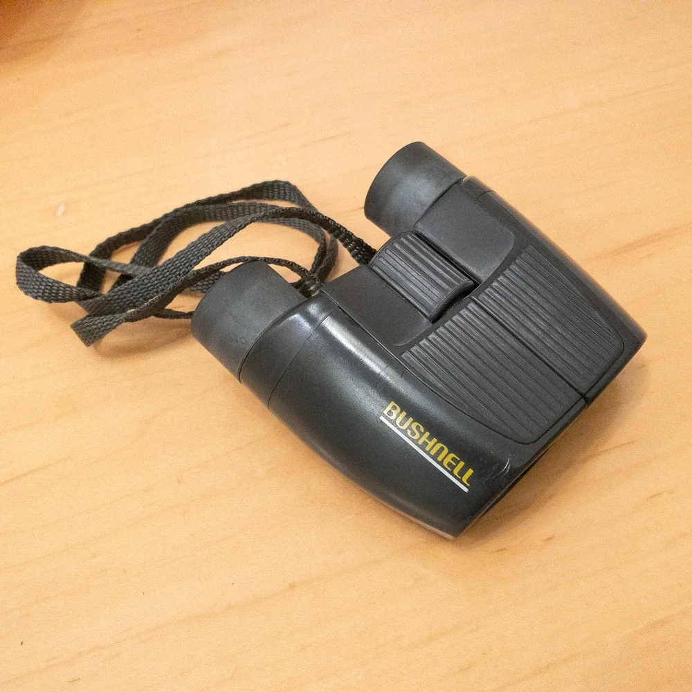 Bushnell Binoculars 10x24 Compact Black Model 13-1024 With Case 262ft/1000yds‎